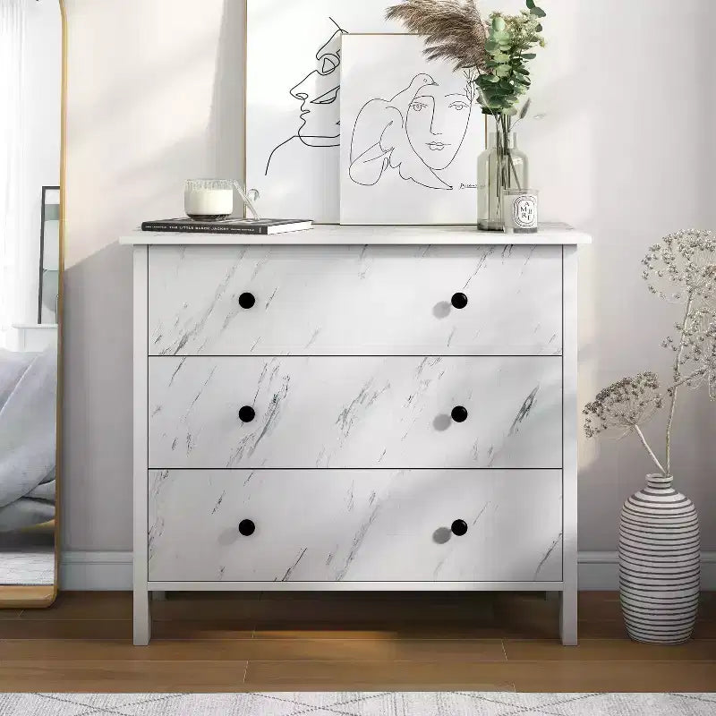 Comò a 3 cassetti con finitura effetto marmo bianco