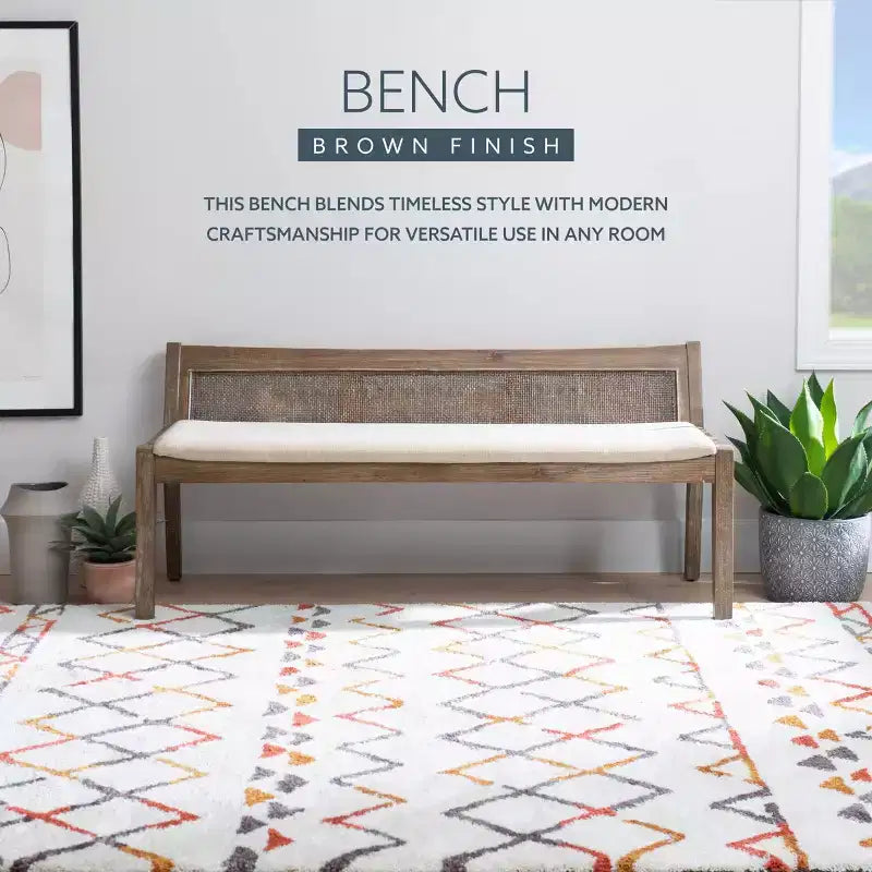 Panca da 132 cm in legno massello con schienale in rattan e seduta imbottita