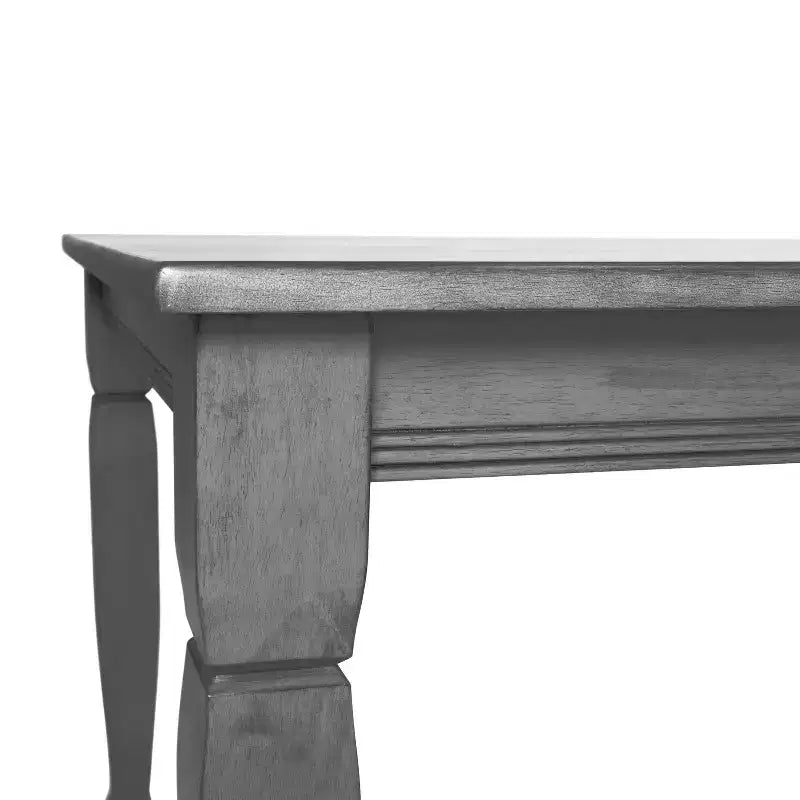 Tavolo da pranzo in legno con gambe intagliate