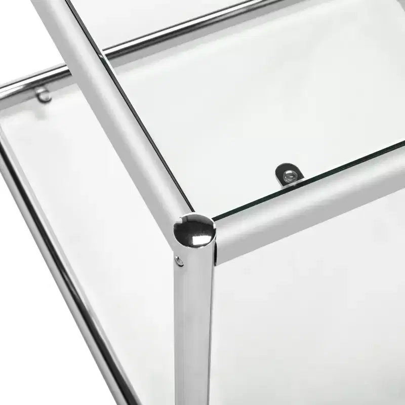 Tavolino in cromo e vetro con ripiano aperto